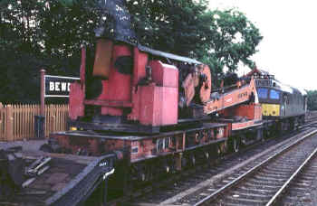 Photographed at Bewdley, this Steam Crane was for a while allocated to Carnforth. Glamorous it may not be, but necessary it certainly would be. The steam crane would be kept at standby near to the motive power depot, and would be taken out for scheduled maintenance work - or for unscheduled emergency work, such as derailments. Toru Ishigaki