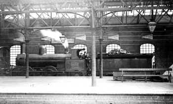 8th July 1905, LNWR 0-6-0 No. 3112 awaits duty in the up (southfacing) bay platform at Carnforth. Cumbrian Railway Association Harold Bowtell collection.