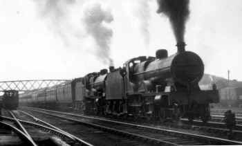 July 1927. LMS Compound 4-4-0's re-start the 10am London Euston - Glasgow Central "The Royal Scot" from Carnforth after changing engines. Cumbrian Railway Association Bowtell Collection.