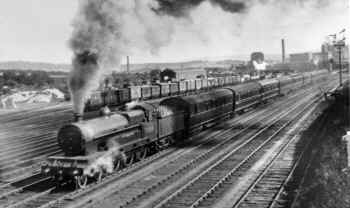 24th August 1931. Ex-LNWR "Claughton" class 4-6-0 LMS No. 5909 "Charles M. Lawrence" leaves Carnforth with a southbound express. Cumbrian Railway Association Harold Bowtell collection.