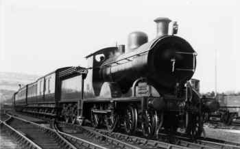 Circa 1920. Furness Railway No.131 nears Carnforth Station with a passenger train from Barrow. LPC 46427.