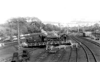 Circa 1970. Ivatt 2-6-0 Engine No. 6441 on the turntable at Steamtown Railway Museum.