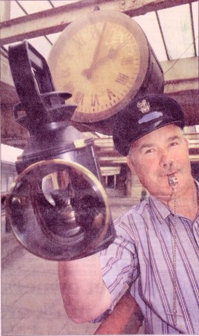 All aboard: Ex-railway man and member of the 'Friends of Carnforth Station' Jim Walker from Carnforth with some memorabilia he took along to the opening of the Tourist Information Centre on Wednesday.