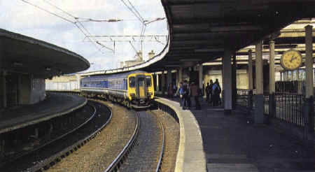 Carnforth station is described by I H Winchester as "disgusting" with peeling paint, no toilets, no waiting room and a dark dripping subway smelling of urine after he was forced to change there during a recent journey.The journey itself was on time but the information from the National Rail Enquiry Service was poor. First North Western 156421 arrives at the shabby Carnforth station with a Barrow-Manchester Airport service on May 21 1999. TONY MILES